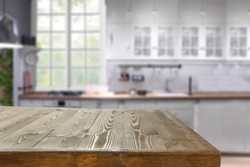 Desk of free space and kitchen interior. 