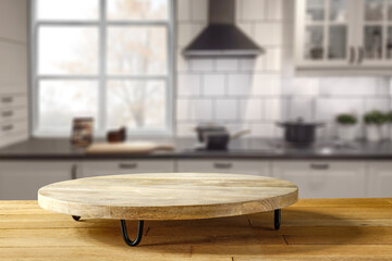 Desk of free space and kitchen inteiror. 