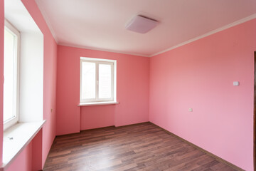 light pink color wall with modern lamp and empty concept and frame.