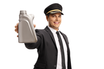 Smiling young professional chauffeur in a uniform holding a bottle of engine oil