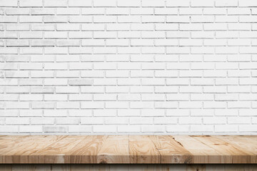 Empty wooden table top and white brick wall and rough crack background texture