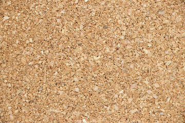 Brown yellow color of cork board textured background with blank copy space