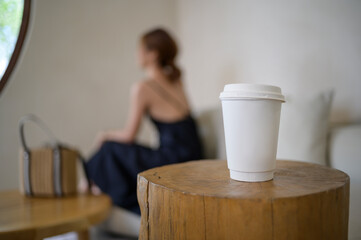 hot coffee paper cup in cafe restaurant.