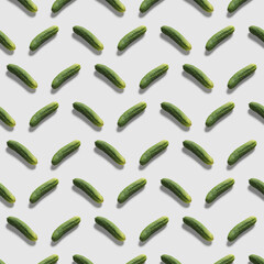  Pattern of fresh green cucumber on white background. Pop art design