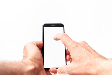 Man hand using smartphone on white background. Closeup shot of man hand holding a smartphone
