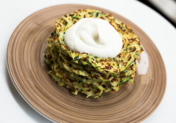 fried zucchini pancakes with greek yogurt