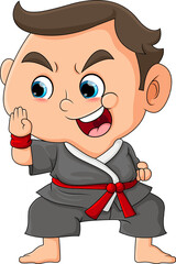 The karate boy is practicing and exercising multiple karate styles and doing stance