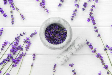 Fototapeta na wymiar Dry lavender flowers on wooden background close up