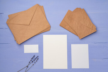 Handmade paper envelope on lavender wooden table