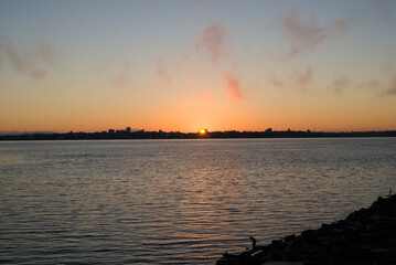 Sunrise over Parana river and the city of Encarnacion, Paraguay