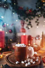 hot tasty cocoa cup with marshmallow on wooden table at christmas holiday