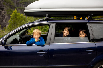 People, children enjoying the amazing views in Norway to fjords, mountains and other beautiful nature