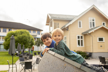 Fototapeta premium People, children enjoying the amazing views in Norway to fjords, mountains and other beautiful nature
