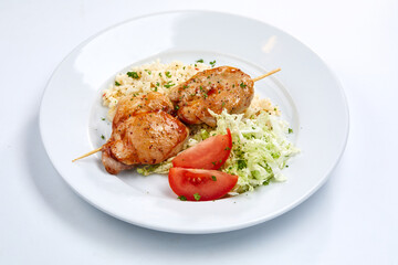 chicken with barley and salad