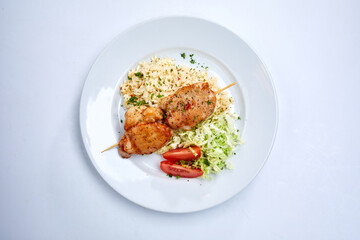 chicken with barley and salad