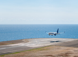 Aiplane landing in Madeira airport - 528494956