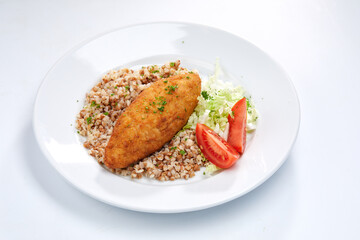 cutlet with buckwheat and salad