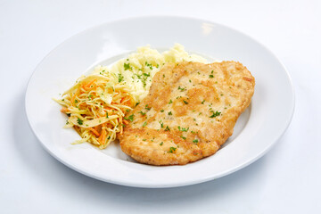 chicken with mashed potato and salad