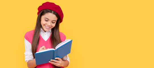 happy teen school girl in french beret making notes in planner notepad or notebook, writing. Banner of school girl student. Schoolgirl pupil portrait with copy space.