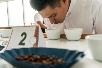 professional coffee taster inspecting the aroma of quality beans in Matagalpa Nicaragua