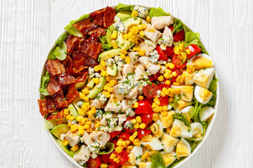 American garden salad on plate, top view