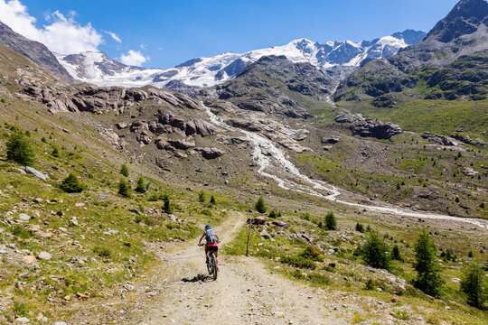 MTB excursion in the valley of Forni in the Stelvio National Park, in the background the Forni glacier, July 2022