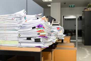 Business documents stack on table, report papers stack.