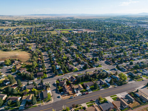 Neighborhood aerial drone picture of cityscape and town with houses and homes from air from aerial drone