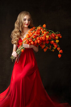 A series of studio photos of a young model with long blond hair in a red dress with a bouquet of dry orange fesalis flowers on a black background