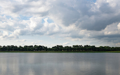 clouds in the sky and a large amount of water in outdoor places