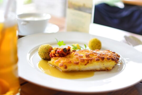 Fried zander fillet with Parisian potatoes (Gebratenes Zanderfilet mit Pariser Kartoffeln) served at Indonesian restaurant