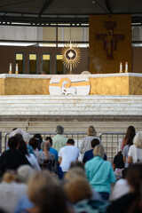 Adoration of Jesus Christ present in the Blessed Sacrament after the evening Holy Mass in Medjugorje, Bosnia and Herzegovina. 2021/09/07. - obrazy, fototapety, plakaty