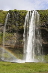 Fototapeta premium waterfall and rainbow, Iceland national park