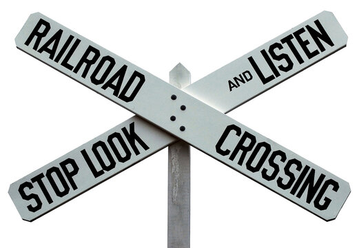 Old Railroad Crossing Sign: This vintage, iconic railroad crossing sign is different from the ones currently in use. The message is clear.