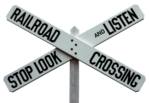 Old Railroad Crossing Sign: This vintage, iconic railroad crossing sign is different from the ones currently in use. The message is clear.
