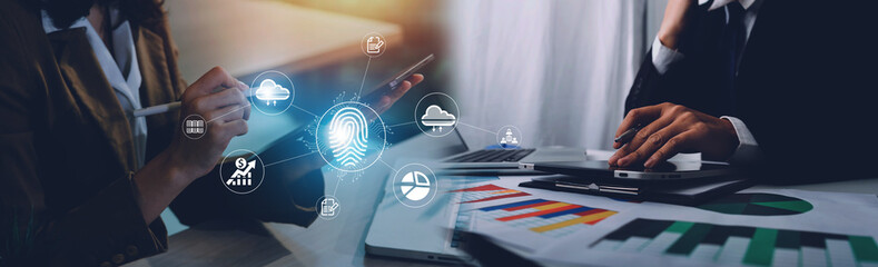 Online transactions, Businessman touching fingerprint scan provides security interface payment shopping banking and cloud computing network connection on virtual screen.