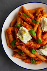 Homemade Penne Alla Vodka With Bacon, Cheese and Basil. Close-up.