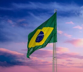 Brazil brazilian flag textile cloth fabric waving on the top sunrise mist fog
