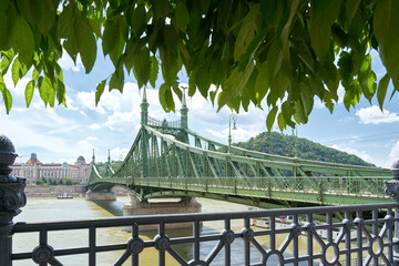 The hostoric Freedom Bridge, Szabadsag hid, in Budapest crosses the Danube River and connects the districts of Buda and Pest