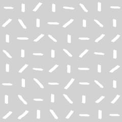 Seamless geometric pattern of white dashes on calm grey color