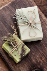 Handmade natural soap on pastel background.