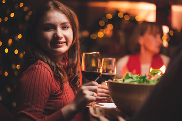 Group of  Happy Family enjoying celebrating Christmas or New Year's eve party with champagne at home. Eve family gathering meeting dream in Christmas or New Year festivals.