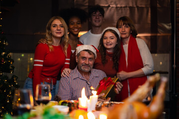 Group of  Happy Family enjoying celebrating Christmas or New Year's eve party with champagne at home. Eve family gathering meeting dream in Christmas or New Year festivals.