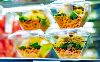 Ready to eat meals displayed in a commercial refrigerator