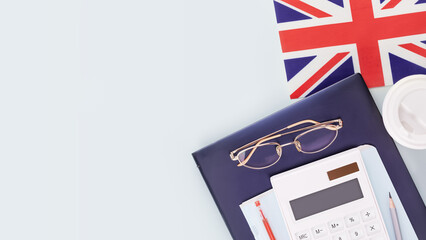 Great Britain education banner with laptop, glasses, calculator, coffee cup and flag of UK on a...