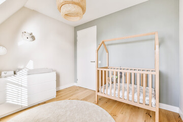 Cradle in spacious modern nursery
