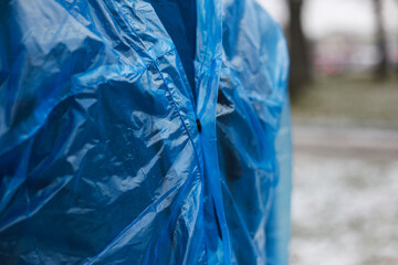 Raincoat on a man, shooting outside