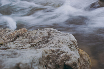 Water flows between the rocks