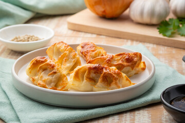 Airfryer gyoza,Use Air Fryer grilled dumplings pork and vegetables on white plate