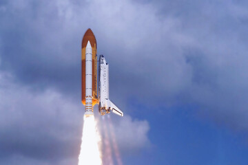 Launch of a space shuttle into space. Elements of this image furnished by NASA